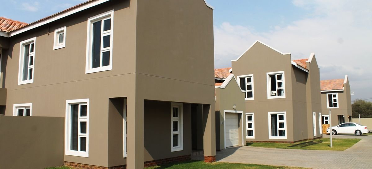 Double-storey home fitted throughout with white uPVC windows